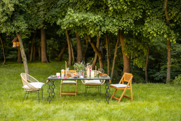 istock Beautifully decorated dining table on nature 1323608950