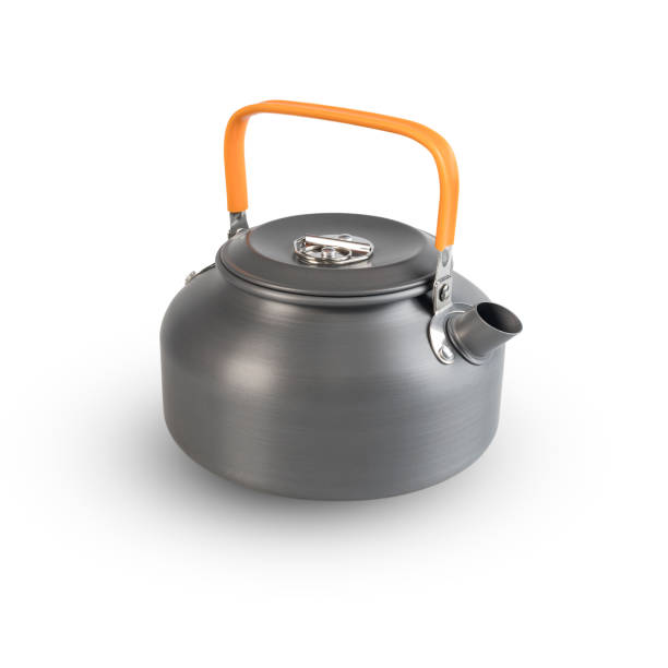 istock Nice design of camping kettle water boiler with orange handle isolated on white background. with clipping paths. 1323609771