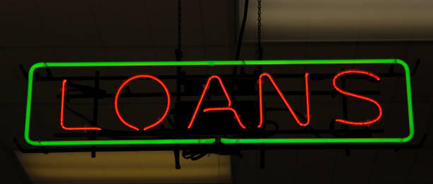 istock Neon Sign Neon Loan Sign in Store Window 1323610794
