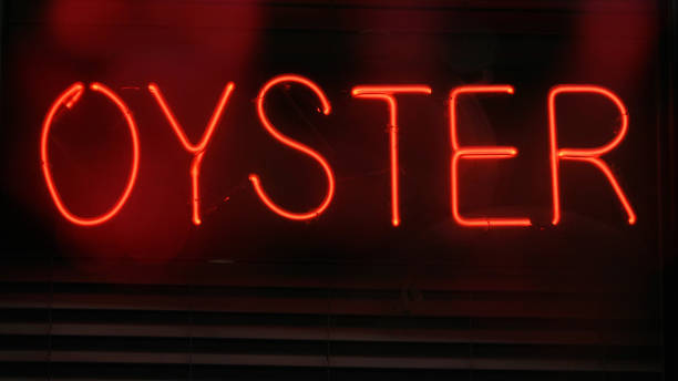 istock Photograph Composite Neon Seafood Restaurant Signs Oyster 1323611622