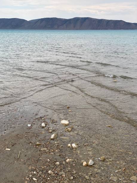 Criss-Crossing Waves Approaching Shore of Bear Lake in Garden City, Utah stock photo