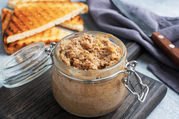 istock Homemade chicken liver pate in a glass jar. 1323614464