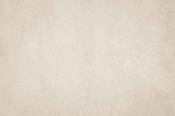 istock Close Up retro plain cream color cement wall background texture for show or advertise or promote product and content on display and web design element concept. Old concrete wall texture background. 1323615984