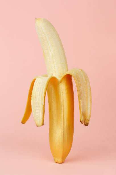 istock Banana coloured by golden paint 1323619873