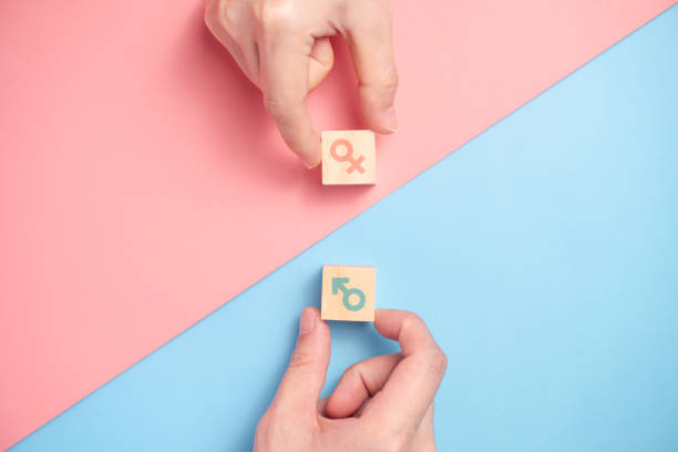 Gender icon on wooden blocks. Gender icon on wooden blocks. Gender equality concepts. feminine symbol stock pictures, royalty-free photos & images