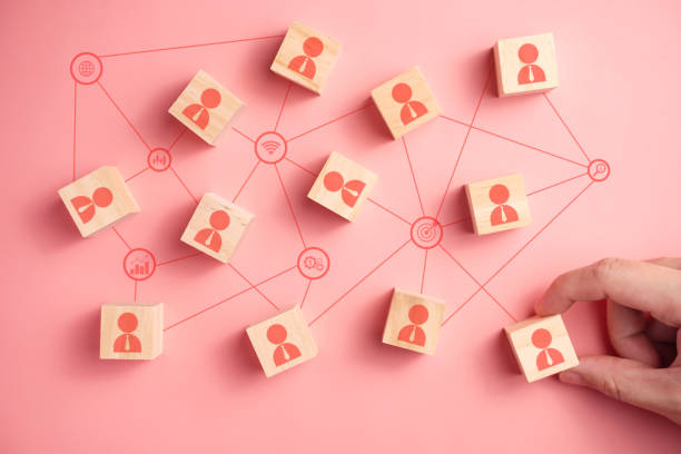istock Wooden block with people icon teamwork business group. 1323620751