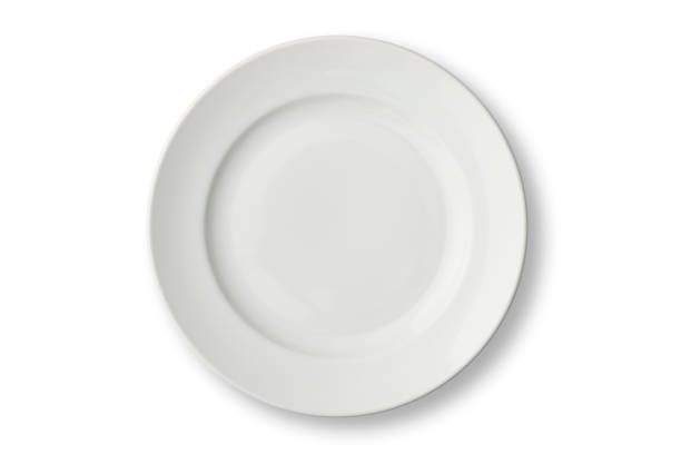 istock Isolated shot of white empty plate on white background 1323622452