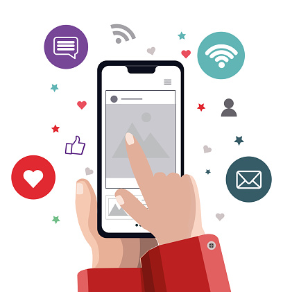 A person has a cell phone in their palm, and touches the screen with the other hand. There is a social media photo on the screen. There are social media icons in the air around the phone, icons such as like, wifi, message, chat, messaging, contacts. Using social media and digital technology concept banner. Background solid white color