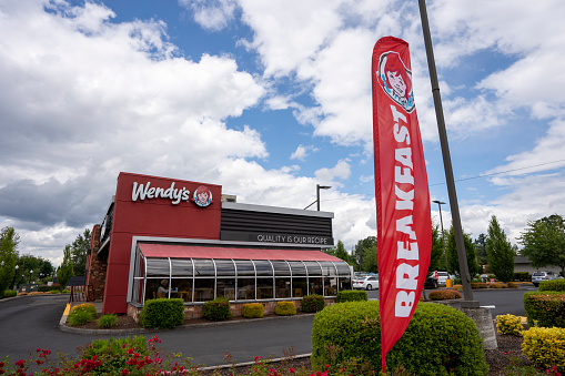 Clackamas, OR, USA - Jun 8, 2021: A Wendy's restaurant in Clackamas, Oregon. Fast Food chains in the US are seeing a gradual return of dine-in business as COVID-19 infections decrease.