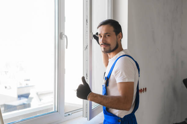 istock Male repairer installs a window and showing thumb 1323624863
