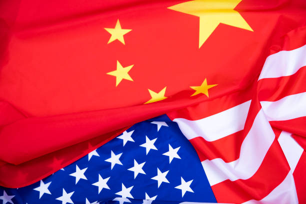 istock Waving USA and China Flag 1323625635