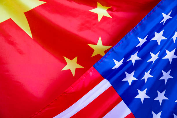 istock Waving USA and China Flag 1323625833