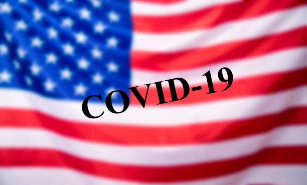 istock Coronavirus and USA flag. 1323626760