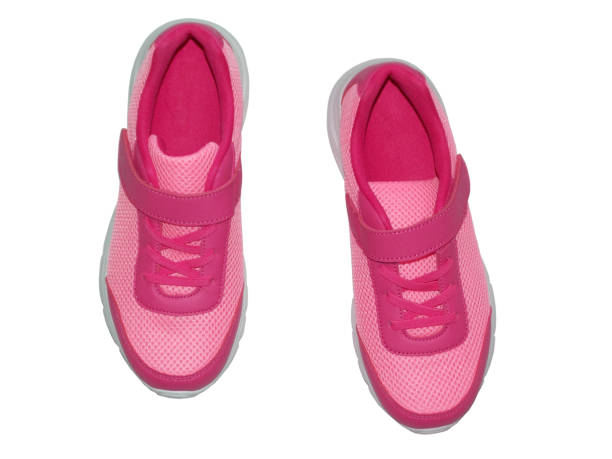Pink youth sneakers Isolated on a white background. Top view.