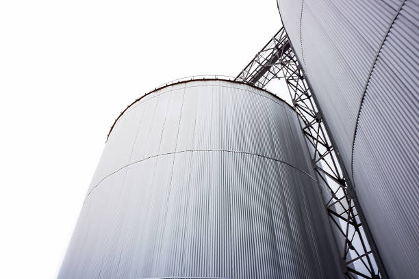 istock Silo Metal Sheet container settles on the ground with white background. 1323628724