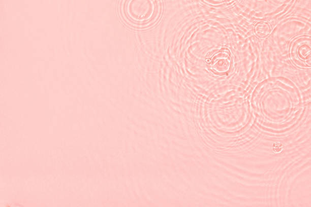 istock pink transparent clear water surface texture summer background 1323630537