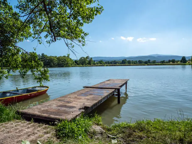 Bathing lake with a view of the Brocken in the Harz Mountains