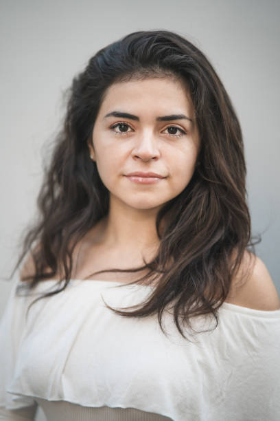 istock Front view of confident young woman. 1323636673