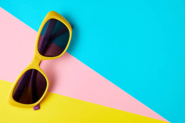 istock Sunglasses on minimal colorful background with copy space 1323637012