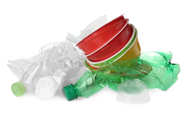 istock Pile of different plastic items on white background 1323638044