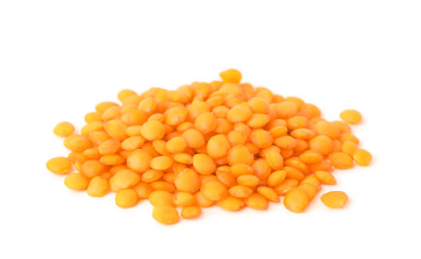 istock Pile of raw lentils on white background. Vegetable planting 1323638570