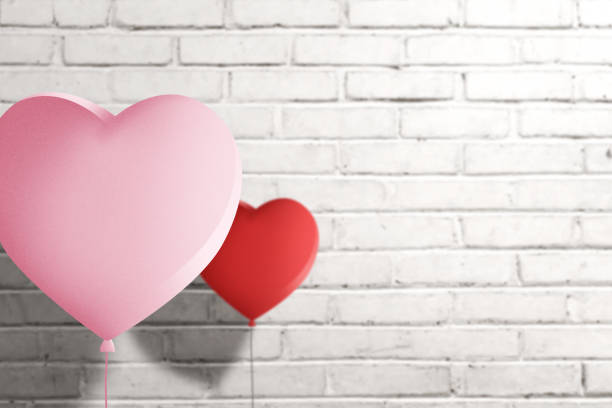 istock Heart balloon with brick wall background 1323639094