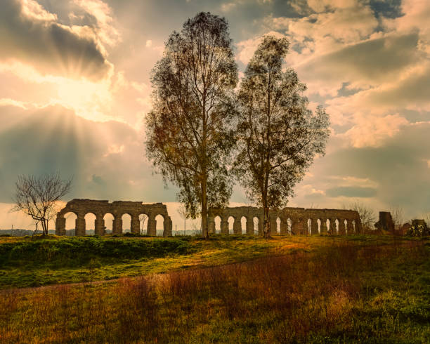istock Roman aqueduct sunset landscape in Rome 1323639951