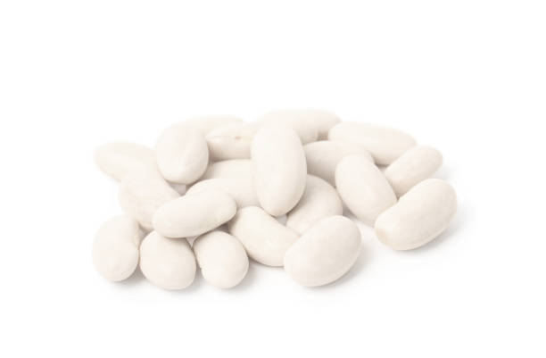 istock Pile of raw beans on white background. Vegetable planting 1323640622