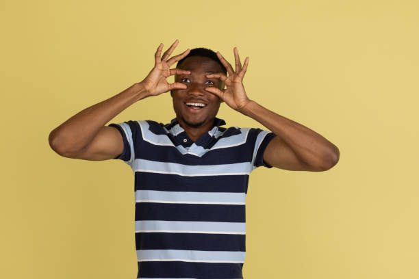 istock African young male portrait isolated over studio background with copyspace 1323644765