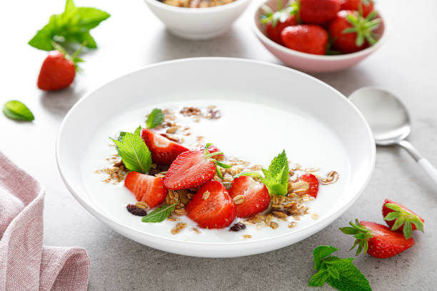 istock Strawberry granola with greek yogurt, nuts and fresh berries for breakfast 1323645989