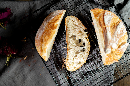 artisan bread: slices of sourdough bread on table