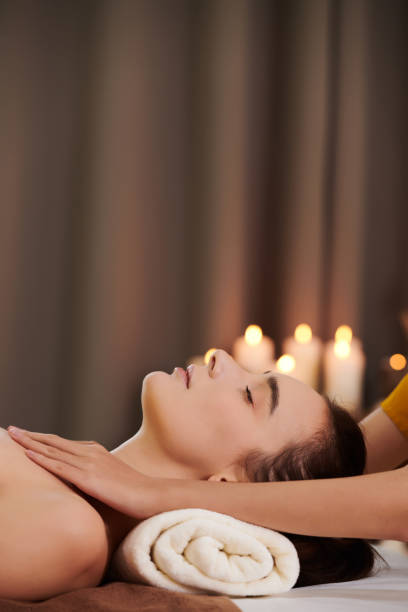 istock Girl relaxing during spa massage 1323657979