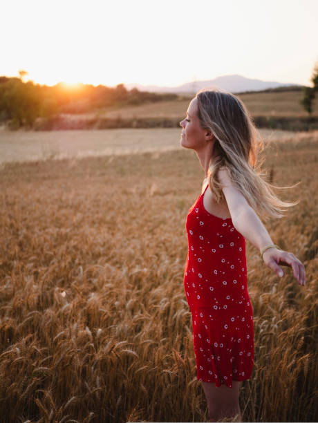 istock Sunset and woman 1323658275