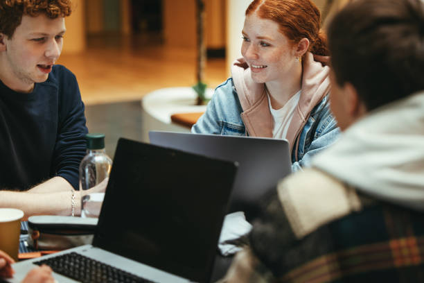istock Young people at university studying in campus 1323662273
