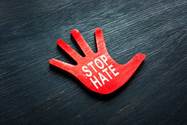 stop hate phrase on the small hand. - fury stok fotoğraflar ve resimler