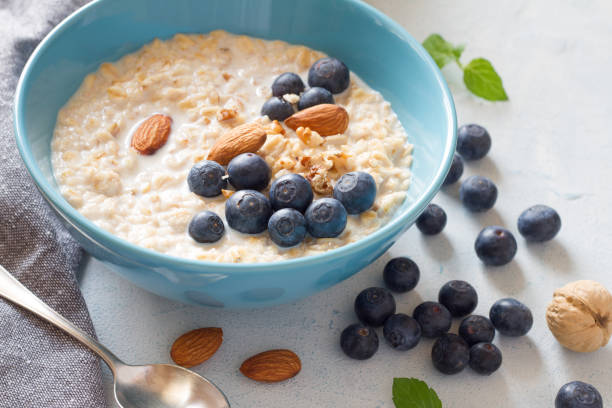 istock Oatmeal with fresh berries and nuts 1323668715