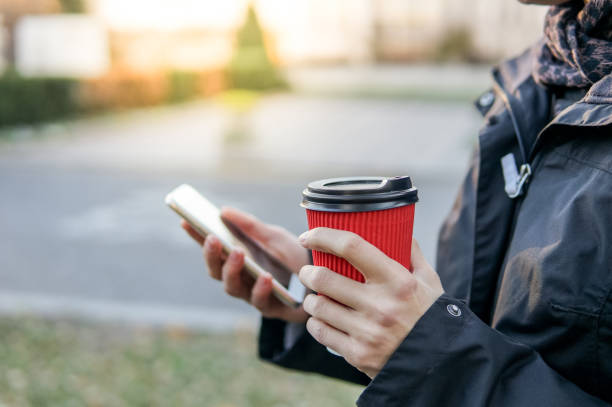 istock Autumn woman with coffee 1323670234
