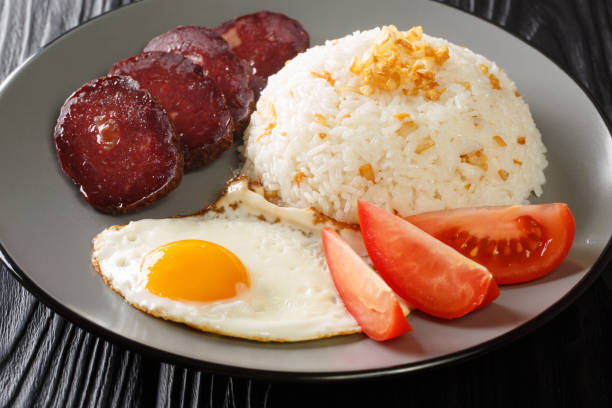 istock Sinangag also called garlic fried rice is a Filipino dish cooked by stir-frying pre-cooked rice with garlic close up in the plate. Horizontal 1323670997