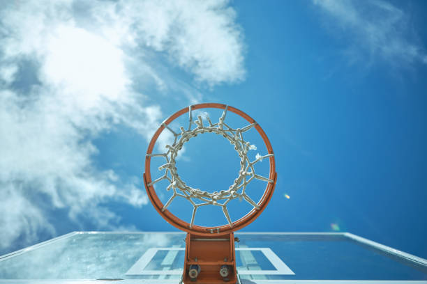 Cropped shot of a basketball net on a sunny day outside Change your perspective back board basketball stock pictures, royalty-free photos & images