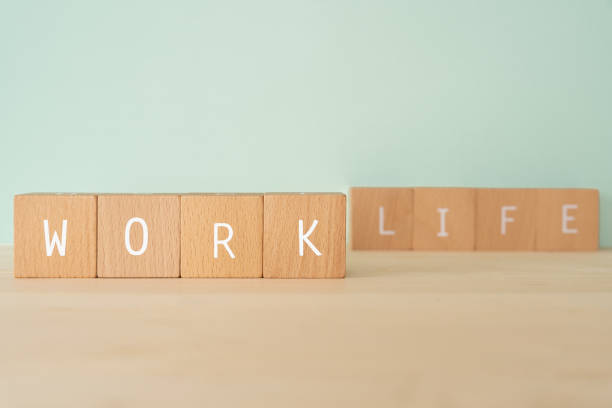 istock WORK, Work-life balance; Wooden blocks with 
