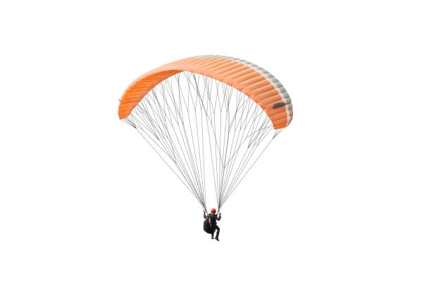 Bright colorful parachute on white background, isolated. Concept of extreme sport, taking adventure challenge.