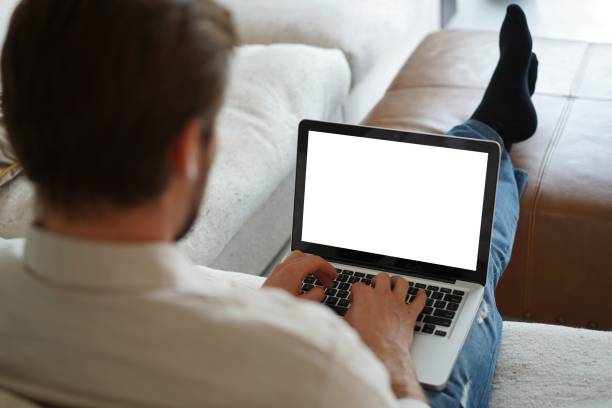 istock Male remote working from home and having work confrence video call. 1323679130