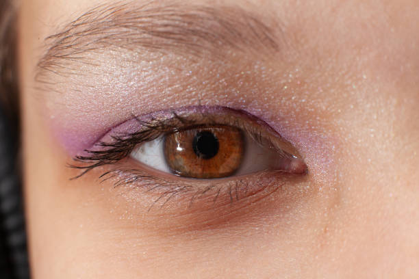 istock Close up of woman's eye with makeup 1323680812