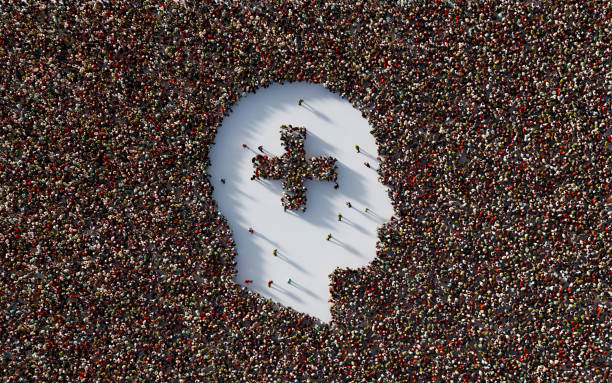 istock Human Crowd Forming Plus Sign Inside Of A Human Head Shape 1323680854