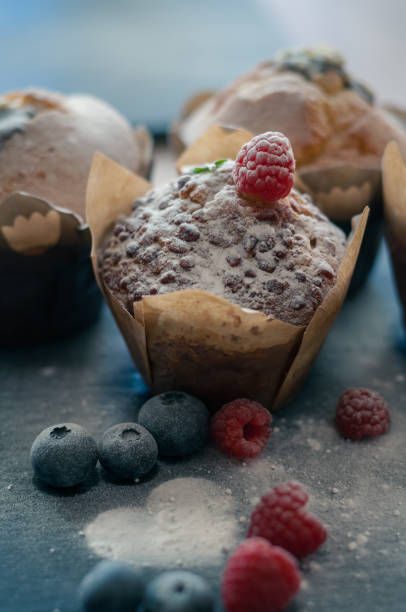 istock muffins with raspberries and blueberries 1323681935