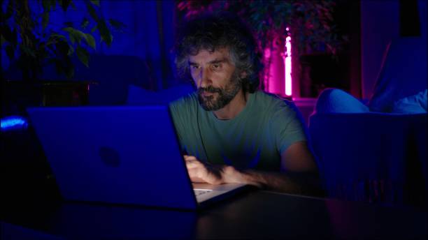 istock Professional working at home, late at night in COVID-19 lockdown. 1323685395