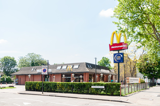 Newham, London, United Kingdom, 30 May, 2021:  McDonald's Forest Gate, Classic, long-running fast-food chain known for its bur,  fries & shakes, Romford Road, Forest Gate, Newham, London
