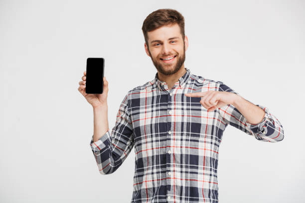 istock Portrait of a confident young man pointing 1323688228