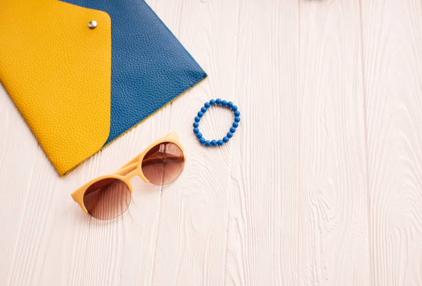 istock Sunglasses bijouterie bracelet clutch bag perfume bottle 1323688340