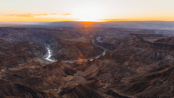 istock Watching the summer sunset above the scenic Fish River Canyon in Namibia 1323698111
